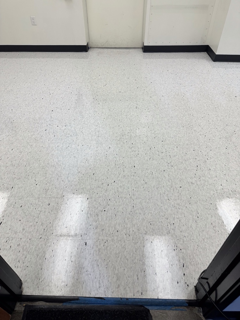 Freshly stripped and waxed VCT floor after a VHH job