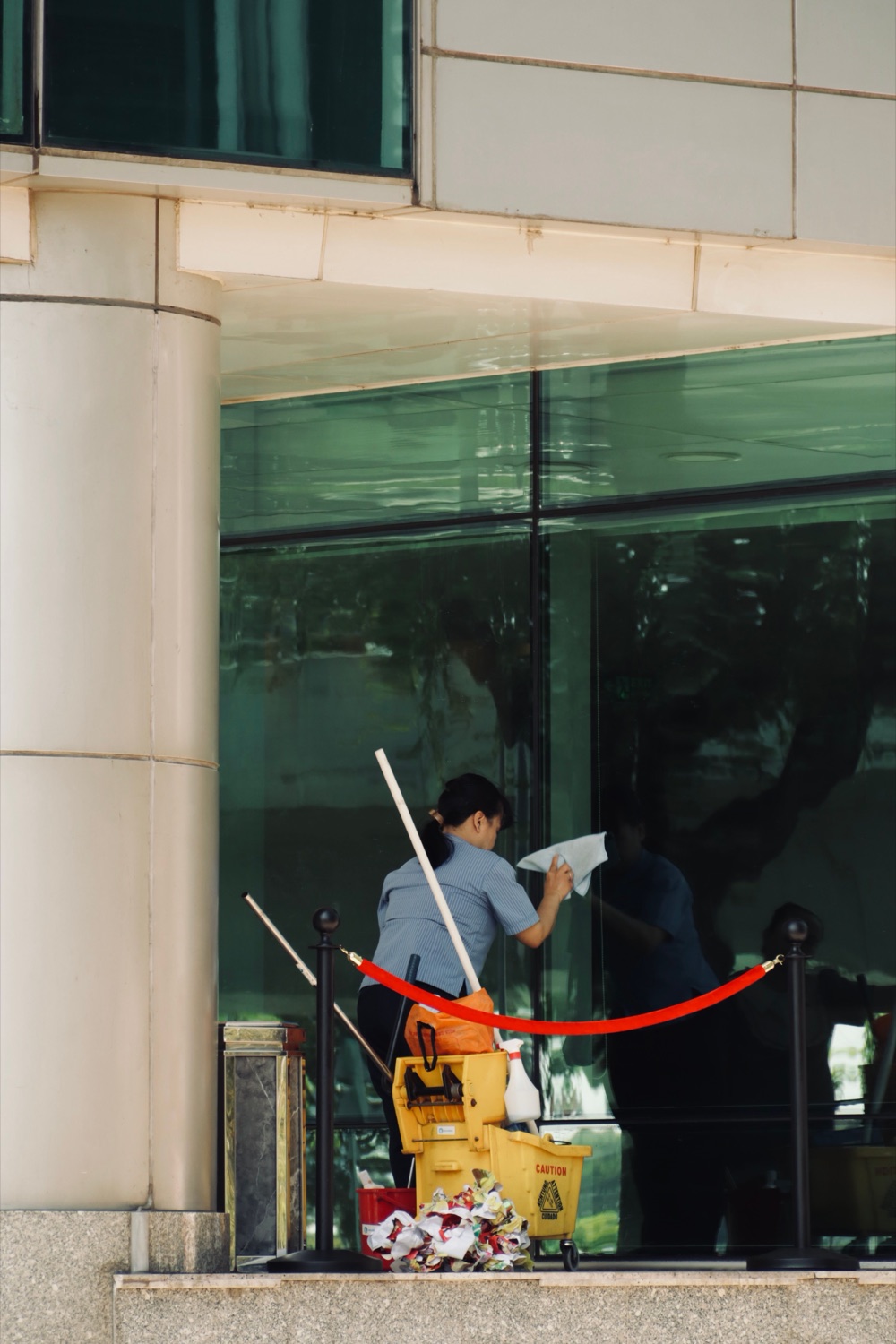 VHH day porter maintaining a commercial facility during business hours